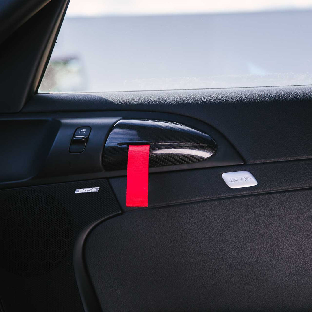 Rennline RS Door Strap Conversion (GT3RS-Style Door Pulls) – Carbon Bezel + Edelstahl-Hardware – Porsche 987/997 Coupé (LHD) – Zugband-Farbe wählbar – Set (links & rechts)